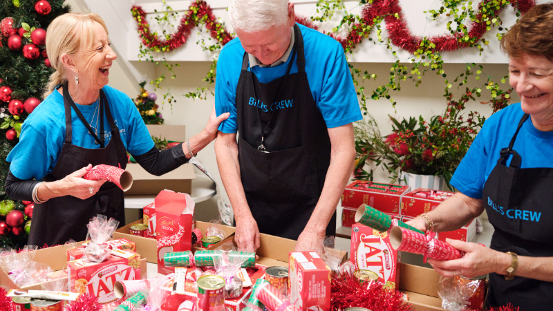 People hosting a food drive.